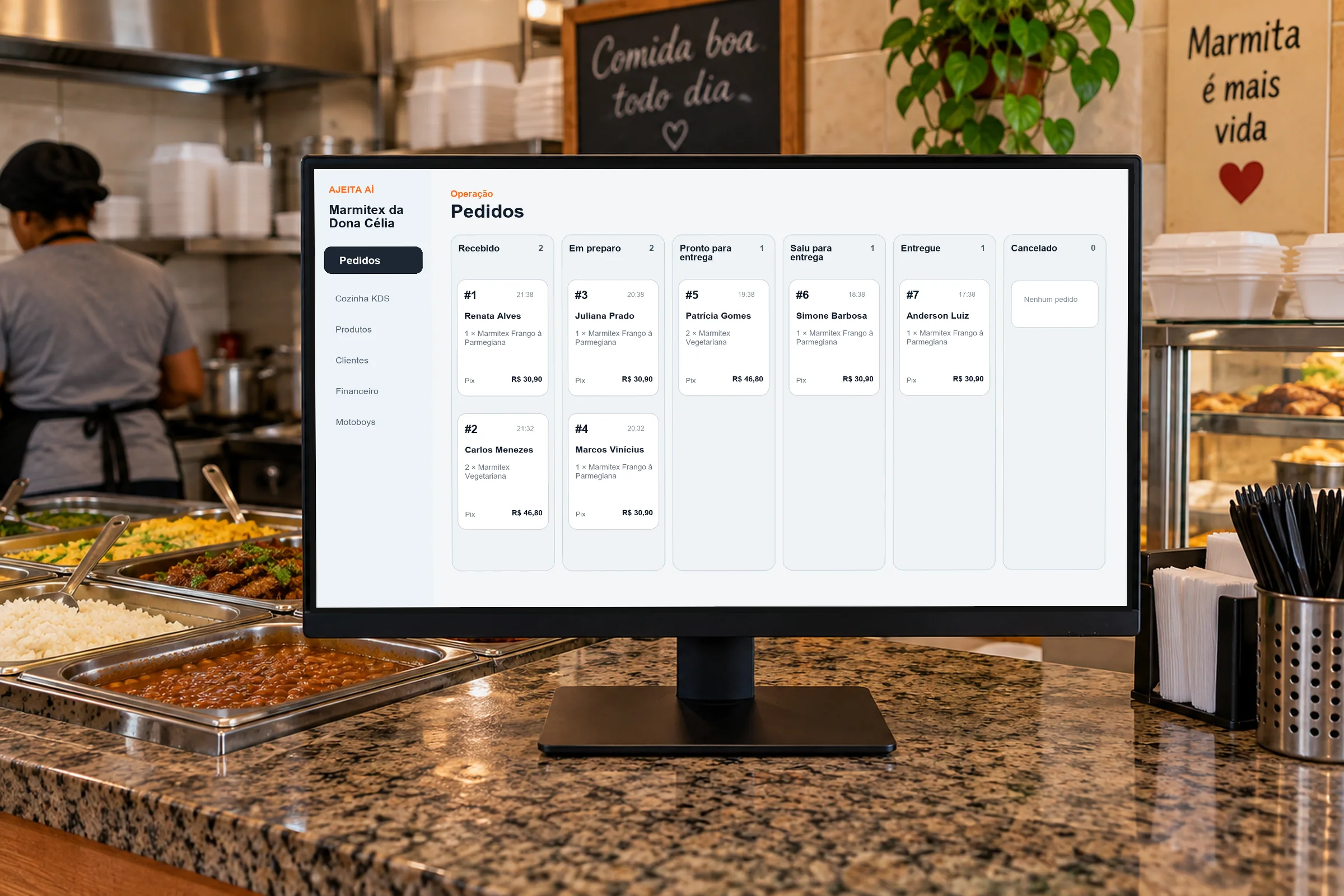 Painel de pedidos da loja Marmitex da Dona Célia aberto em um monitor no balcão